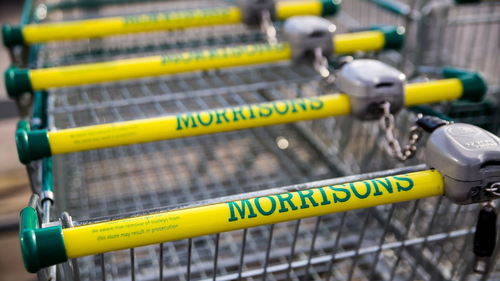 LEEDS, UK ... 9 FEBRUARY 2016.  Morrisons supermarket trolley showing logo outside supermarket in Leeds, UK.