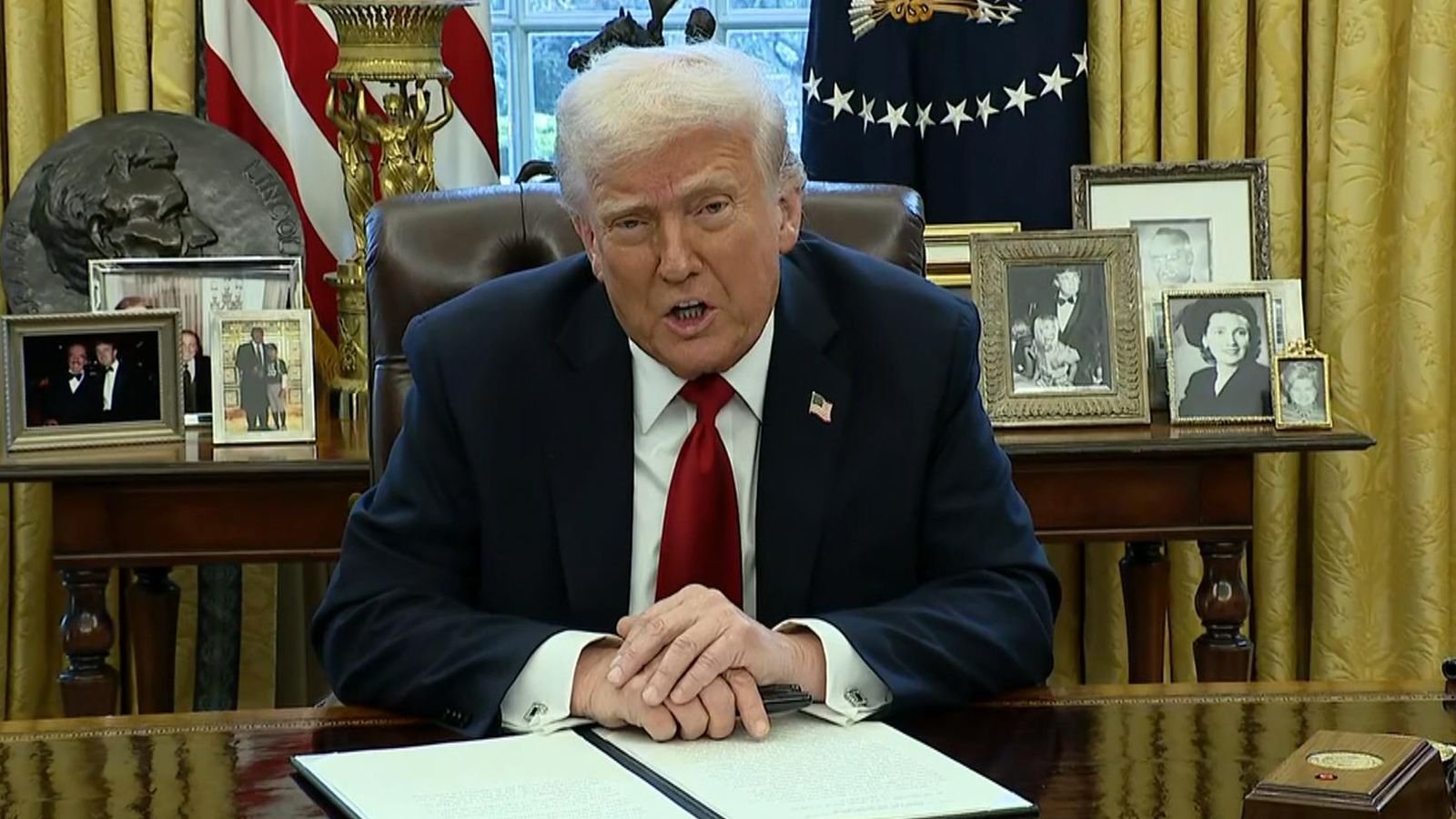 Donald Trump announcing the 25% tariff on imported cars.