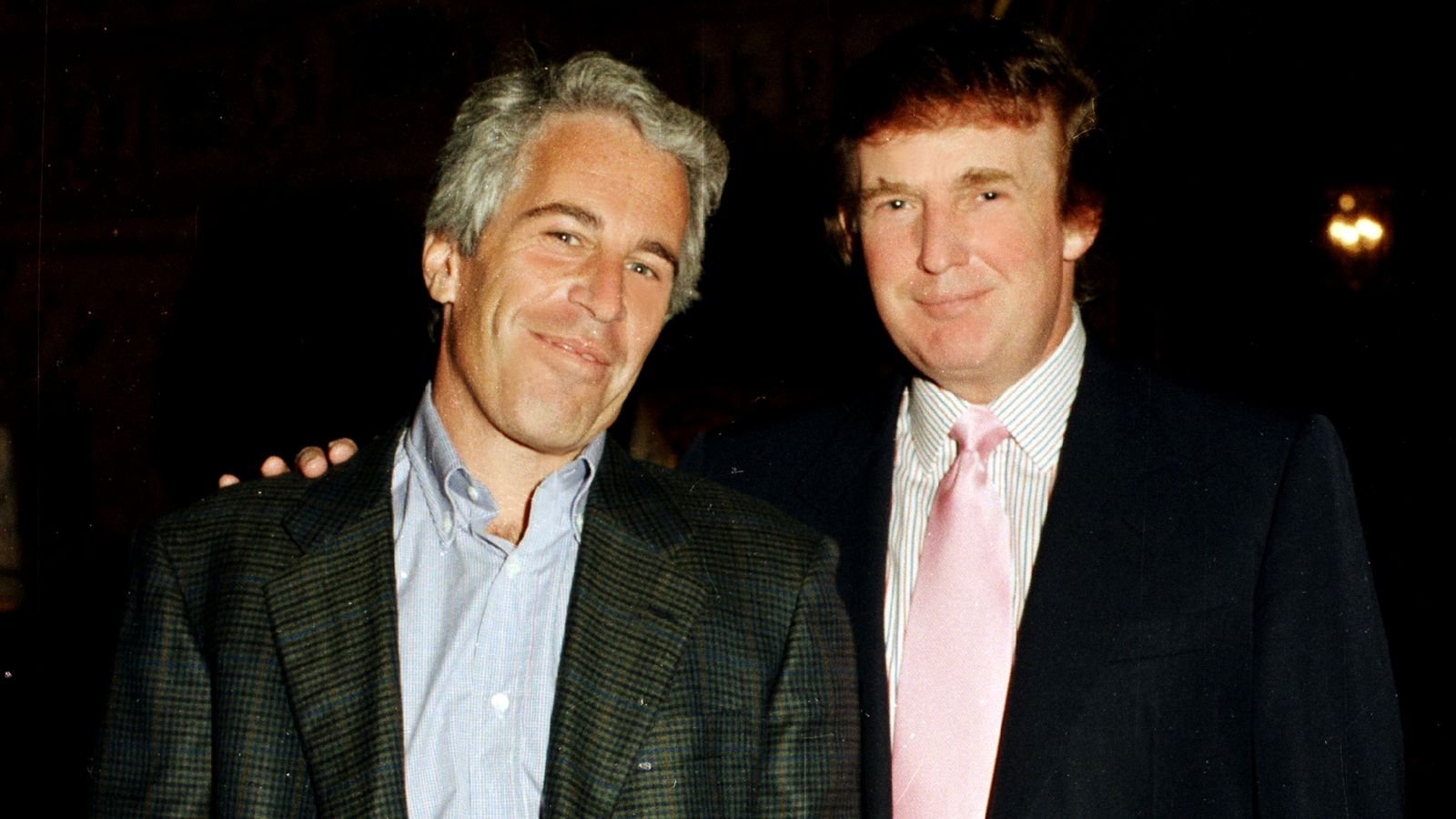Donald Trump at his Mar-a-Lago estate in Florida with Jeffrey Epstein in 1997. Pic: Getty Images