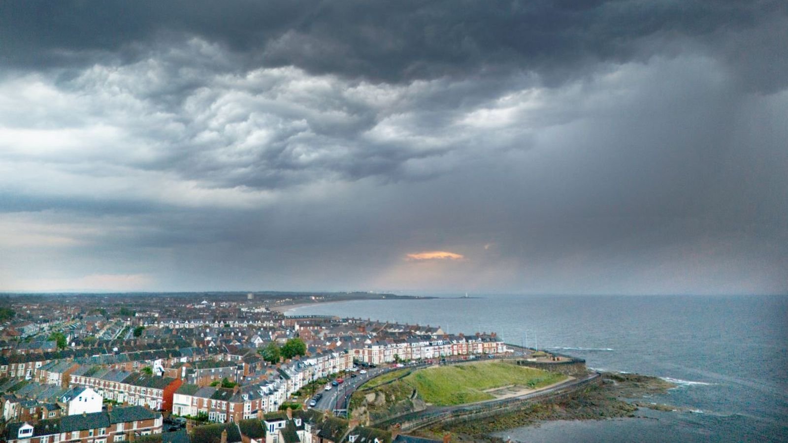 Storm clouds above Whitley Bay in North Tyneside on Saturday. Pic: PA