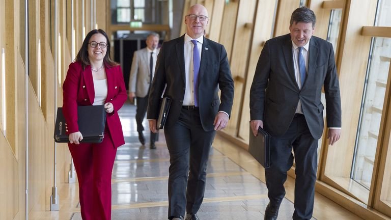 Deputy First Minister Kate Forbes, First Minister John Swinney and Mr Hepburn. Pic: PA