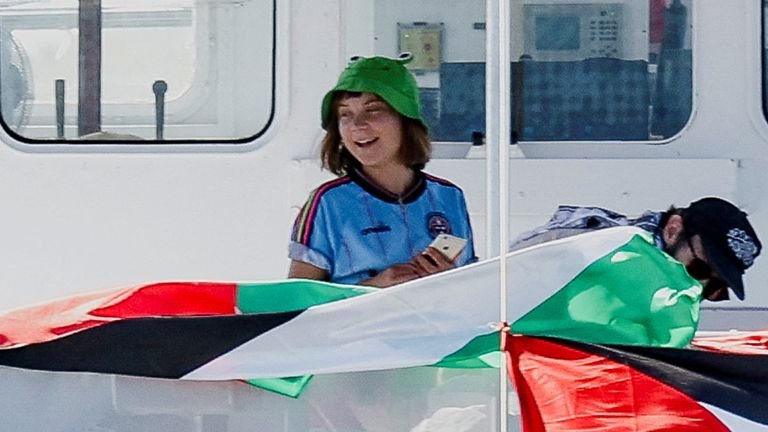 Greta Thunberg and other activists on the flotilla await their departure in Barcelona. Pic: Reuters