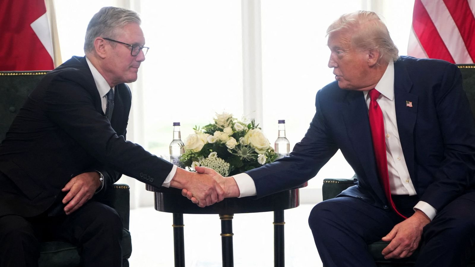 Donald Trump shakes hands with Sir Keir Starmer at Trump Turnberry golf club in July. Pic: Reuters