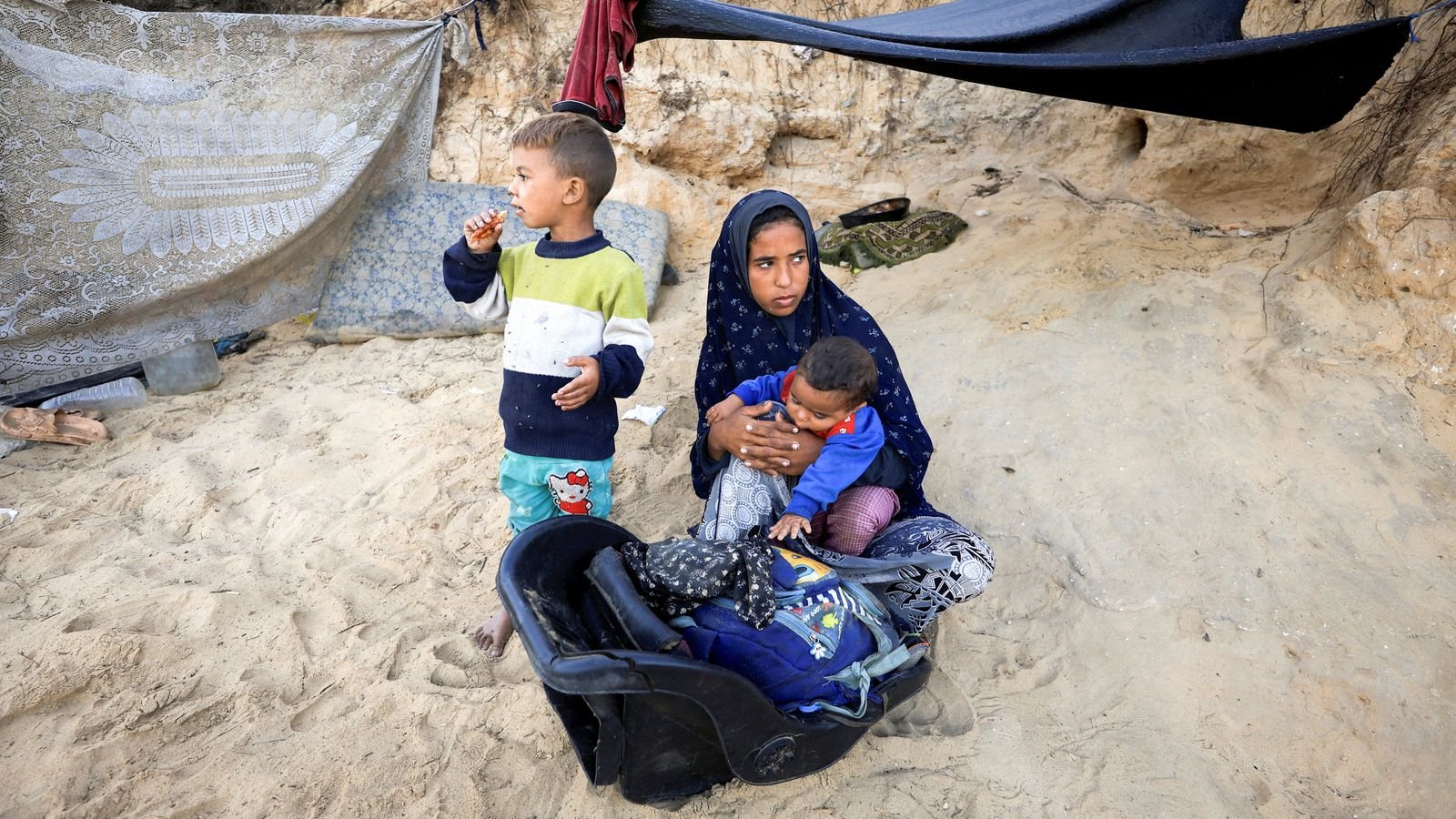 Displaced Palestinians, who fled northern Gaza after Israeli forces ordered residents of Gaza City to evacuate to the south. Pic: Reuters