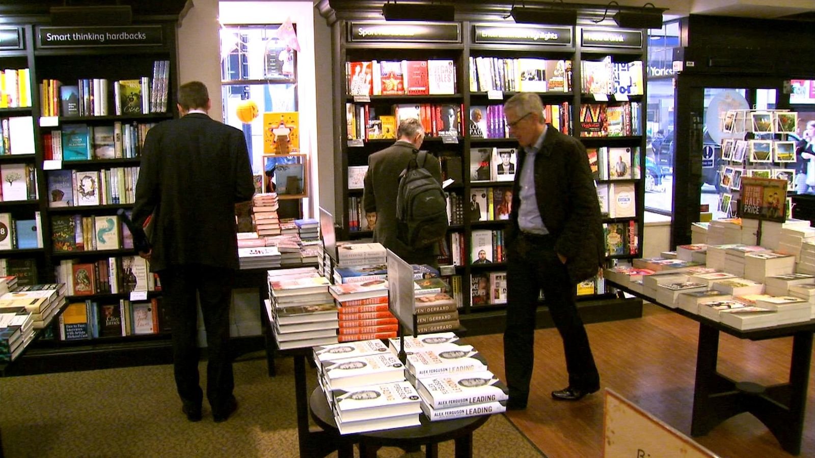 Customers are seen in a Waterstones shop