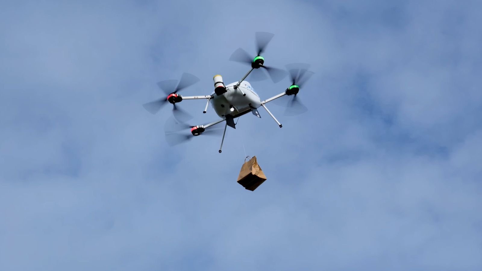 The packages are lowered to the ground using biodegradable string. Pic: Manna Aero