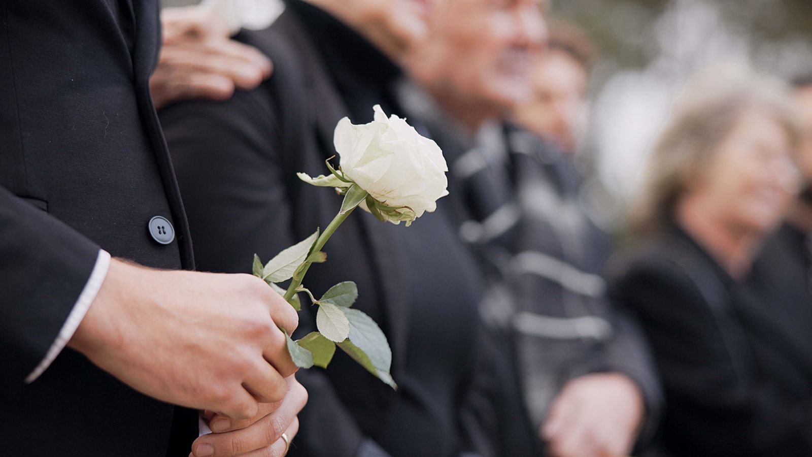 Mourners at a funeral. Pic: Jacob Wackerhausen, iStock