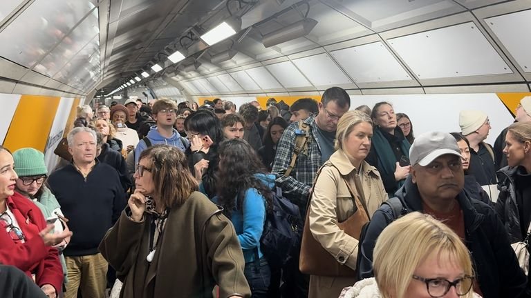 Elizabeth Line passengers queuing to exit Heathrow T2/3 