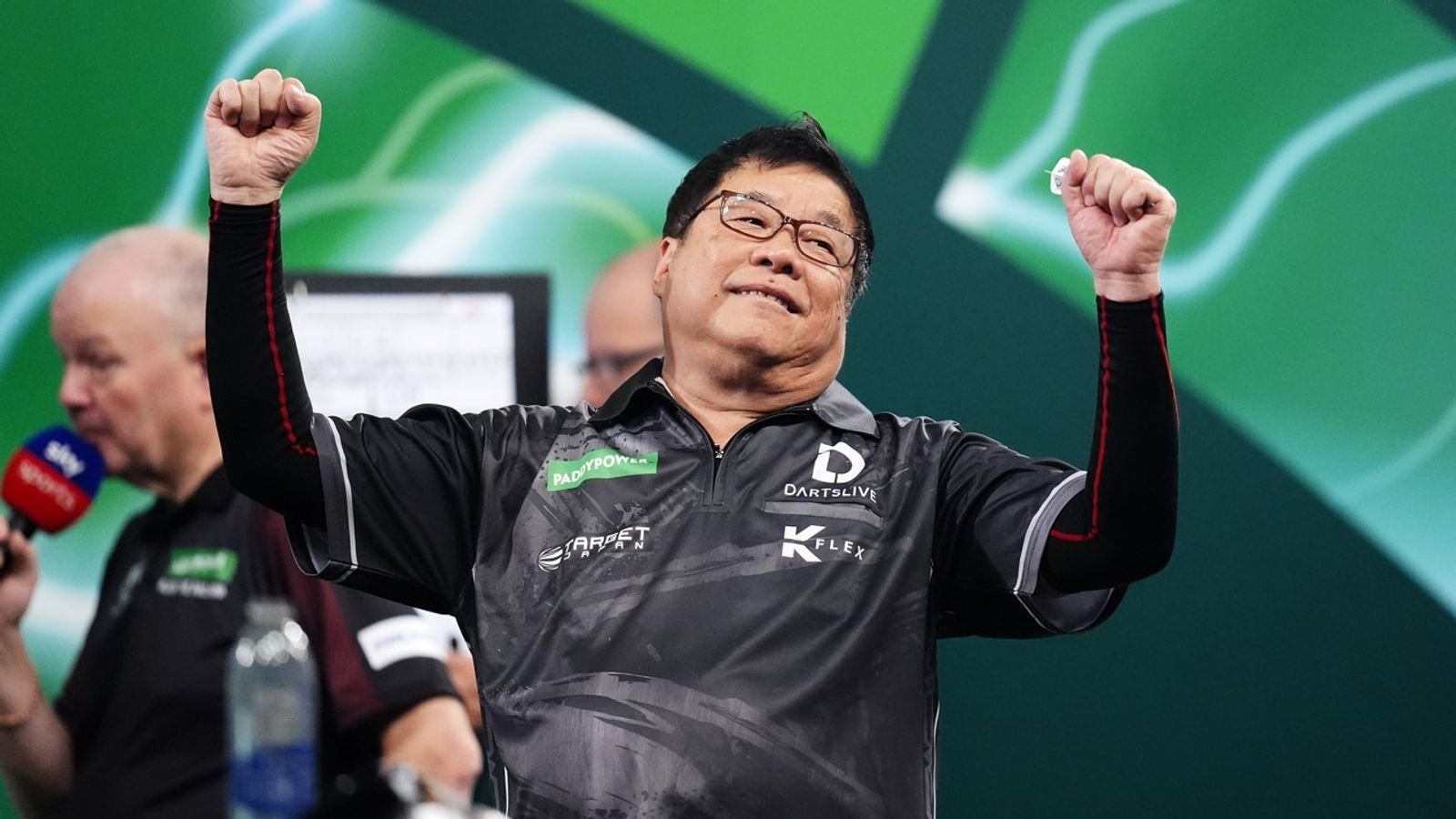 Paul Lim celebrates winning his match against Jeffrey de Graaf. Pic: PA