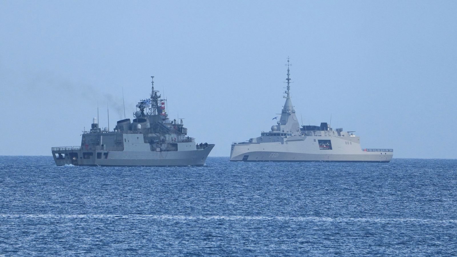 The Greek frigates Psara, left, and Kimon sail off the coast of Limassol, Cyprus, on Wednesday, March 4, 2026. (AP Photo/Petros Karadjias)